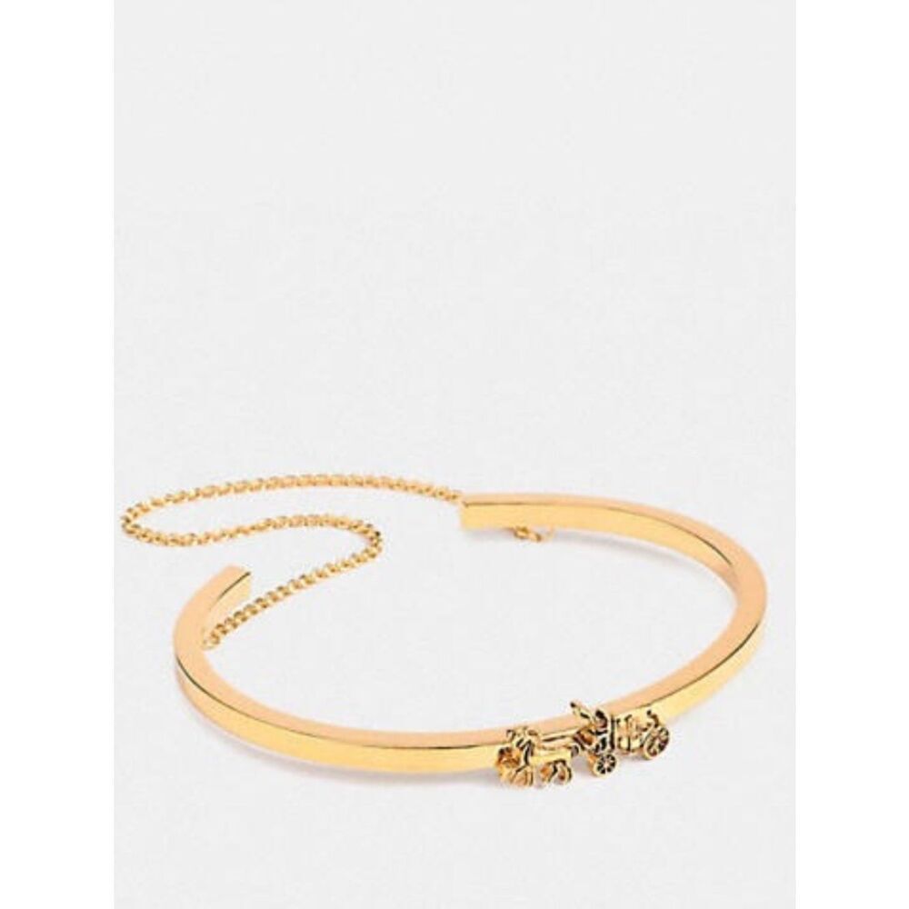 Coach Gold Tone Horse-and-Carriage Bangle Bracelet